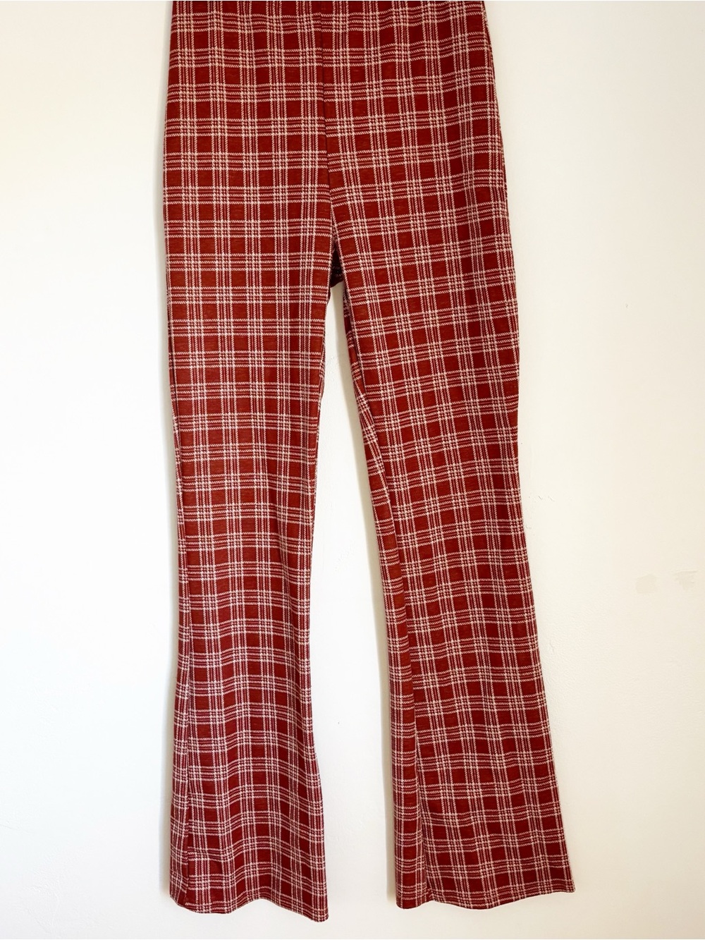 Shop Stevie Fall Orange Plaid flare pants